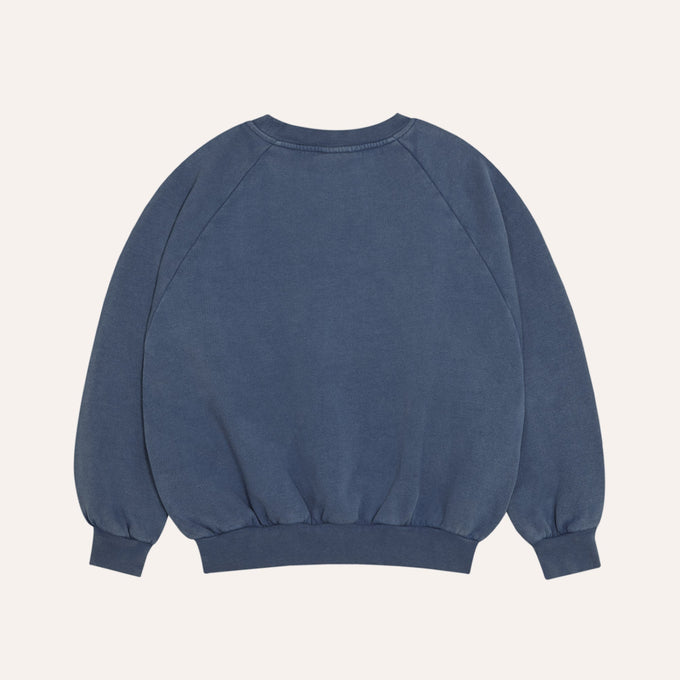 The Campament ザカンパメント <br>The Campamento Blue Sweatshirt<br>TC-AW26-56