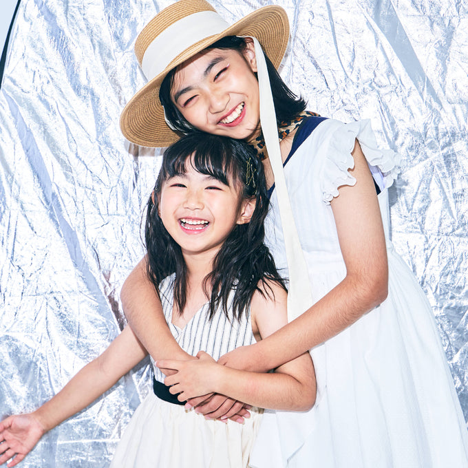 Popelin ポペリン<br>Black striped short dress with crossover front<br>Mod.45.3