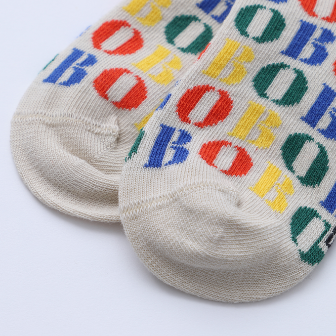 BOBOCHOSES ボボショーズ<br>222AI033<br>Multicolor Bobo Choses long socks<br>BOBOロゴ総柄ソックス